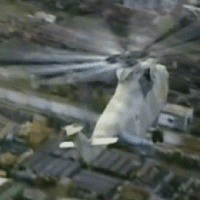 Hlídkující vrtulník nad vybuchnutým Černobylem